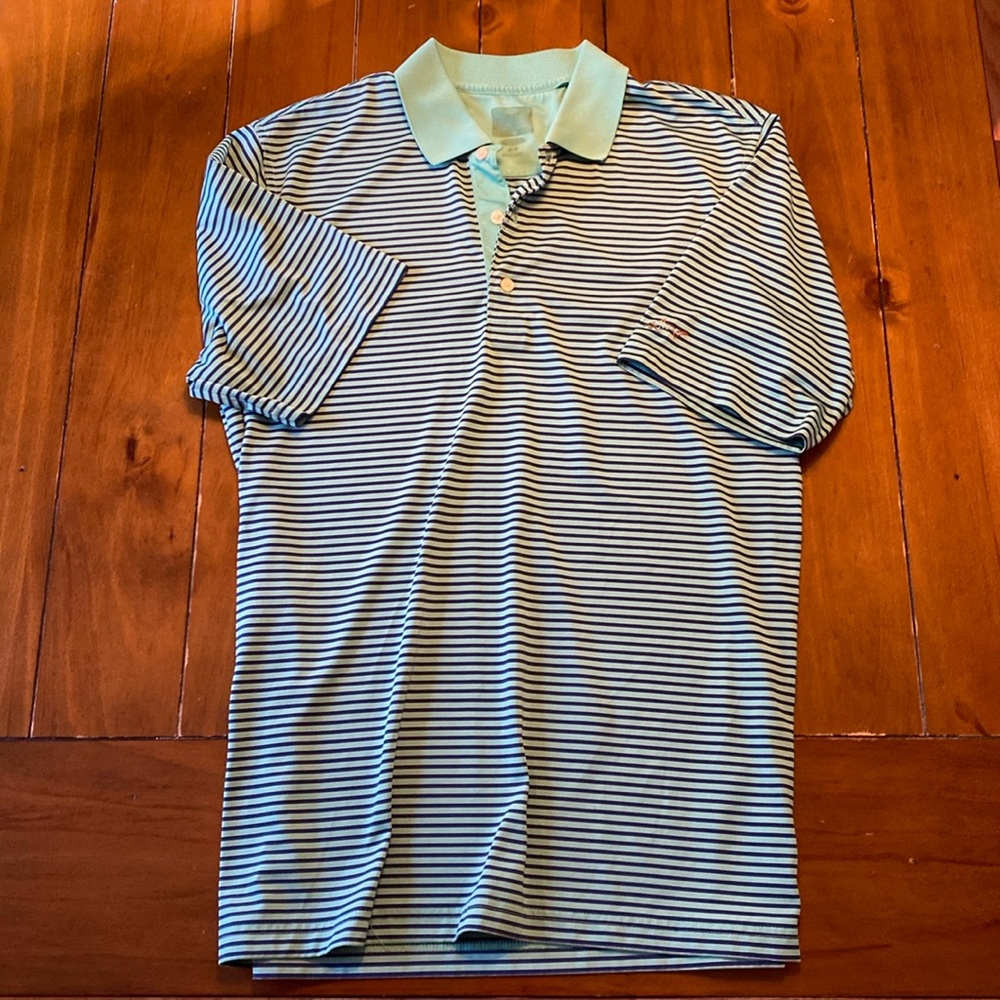 Greg Norman men’s M golf polo. Logo on left sleeve.